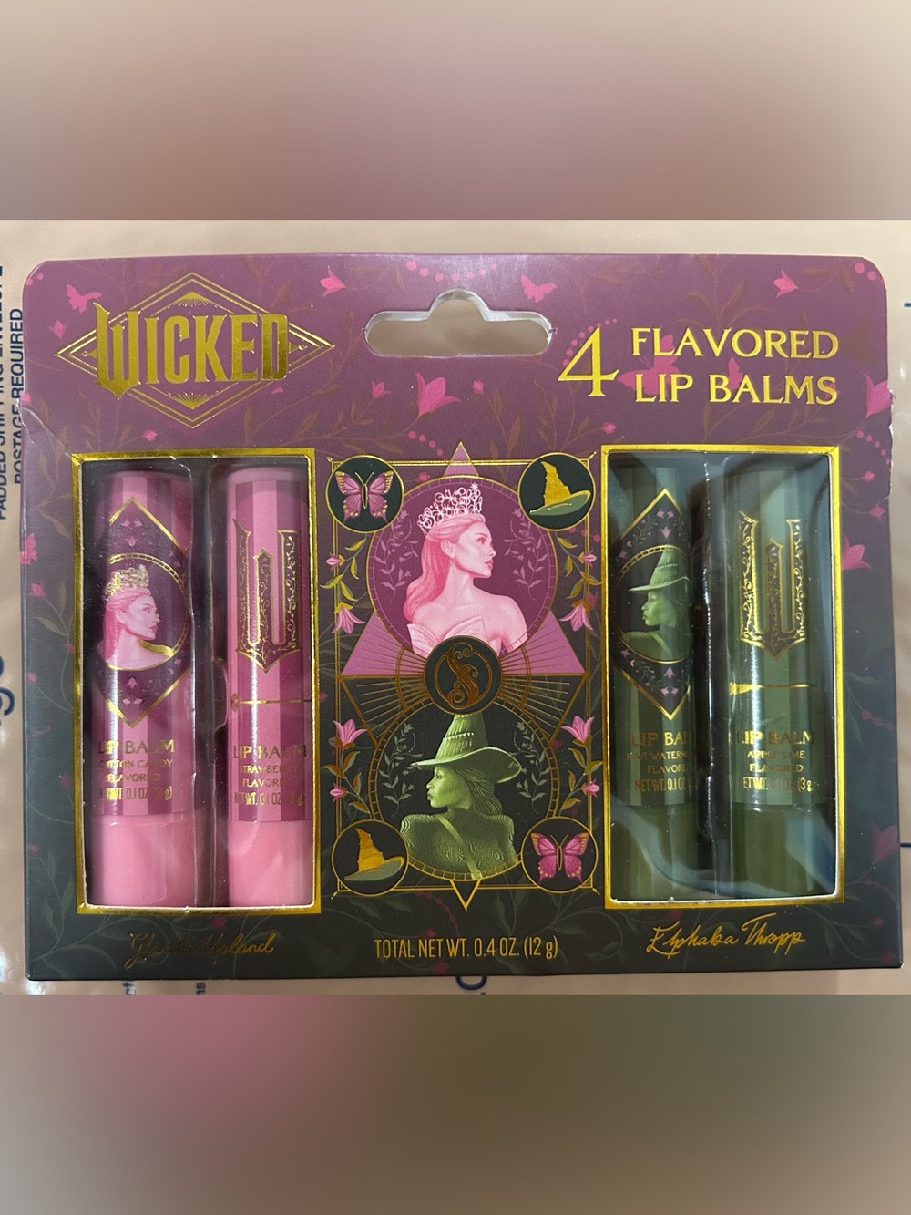 Wicked 4 Lip Balm Set. TASTE BEAUTY. 2 Glinda, 2 Elphaba. NWT. Universal Stud.